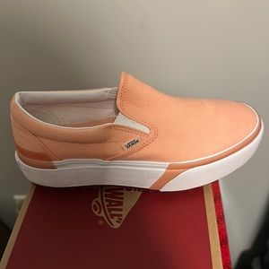 Peach colored platform vans